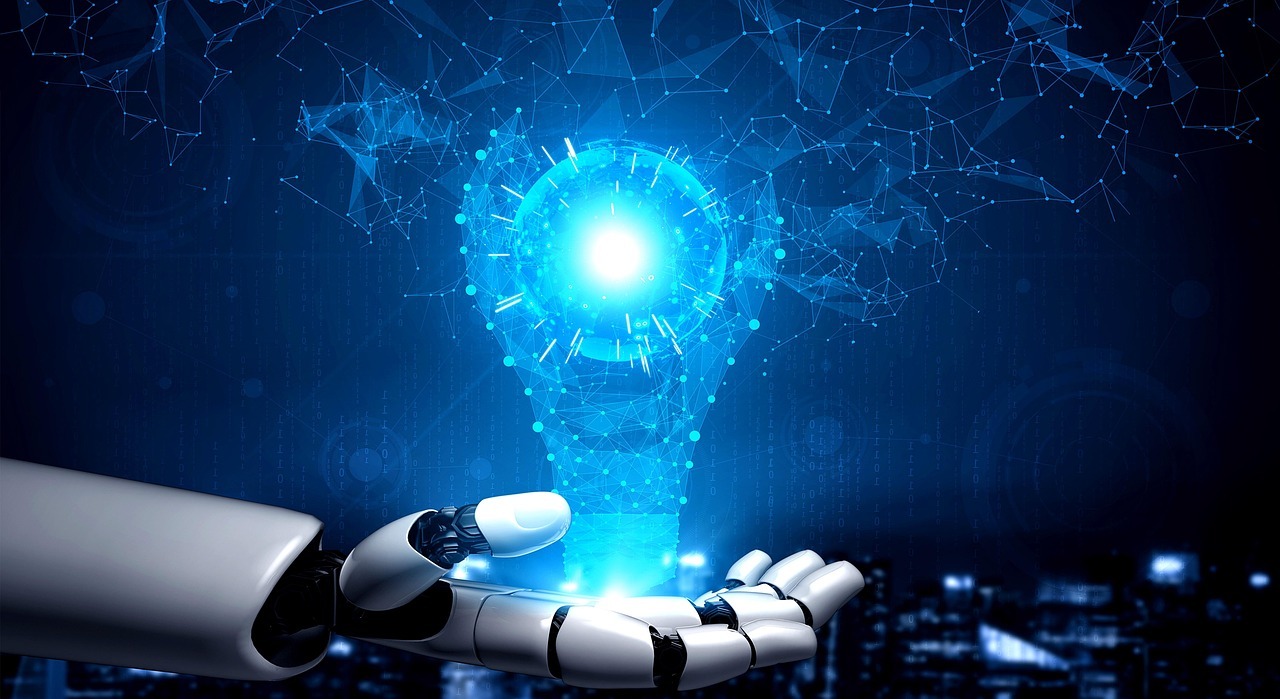 Robot hand holding glowing light bulb